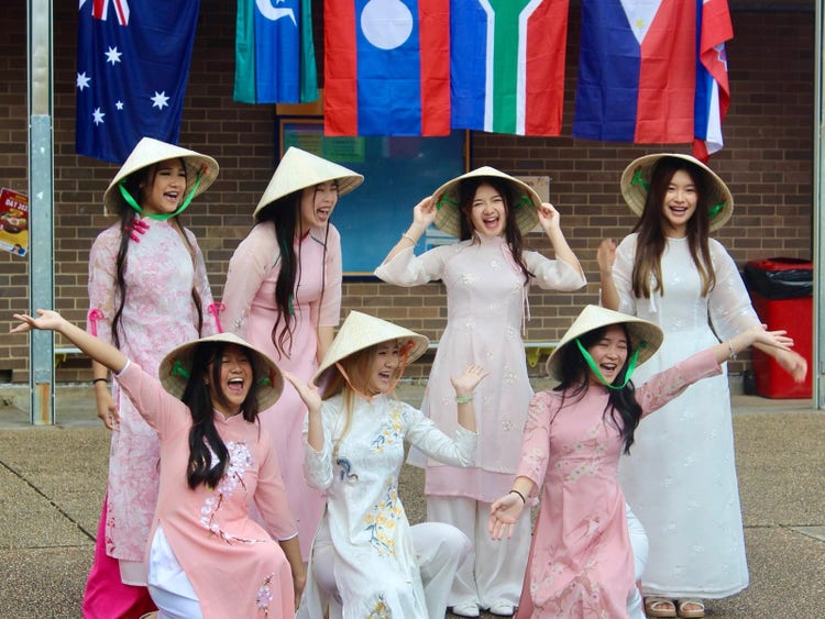 Students in traditional clothing at multicultural day