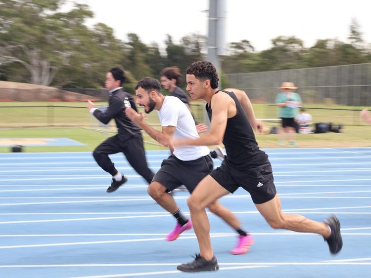Students running a race during Athletics Carnival