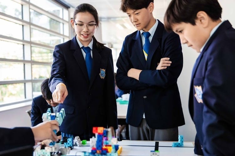 Students working with robotics