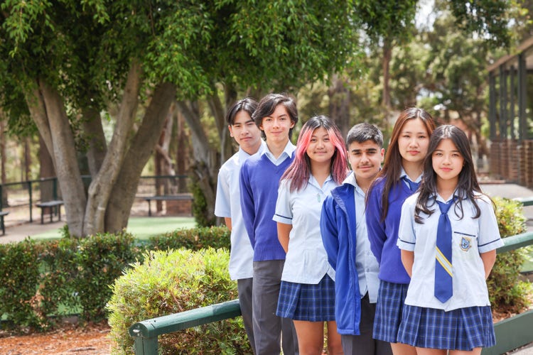 Students in a line in the courtyard